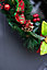 Christmas Wreath With Ribbons Baubles And Poinsettia