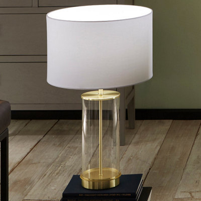 Clear Glass and Champagne Metal Table Lamp with  Ivory Poly Cotton Cylinder Drum Shade