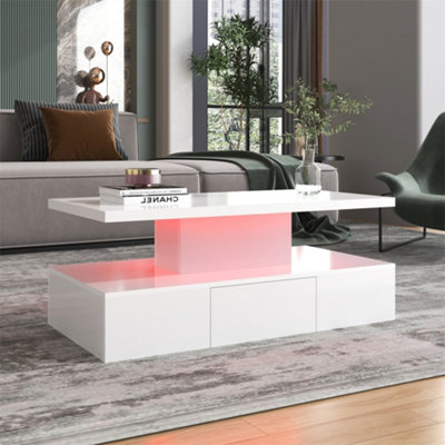 Coffee table, table with drawer, high-gloss finish, side table with two storage levels. With LED light