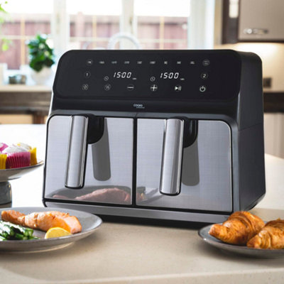 https://media.diy.com/is/image/KingfisherDigital/cooks-professional-air-fryer-dual-digital-8l-xl-2400w-timer-double-drawers-healthy-cooker-silver~5060918671506_01c_MP?$MOB_PREV$&$width=618&$height=618