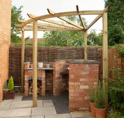 A corner pergola framing an outdoor kitchen, creating a stylish and defined space for cooking.