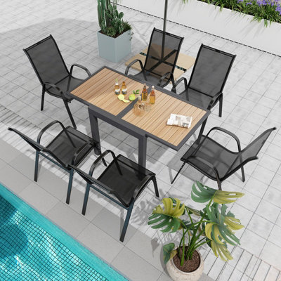 Costway 4-6 People Extendable Patio Dining Table Wood-like Rectangular Aluminum Table - 9