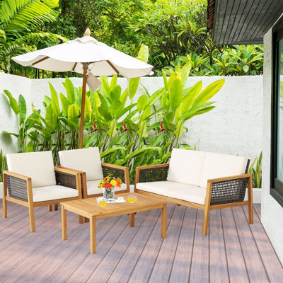 Costway 4 Pcs Patio Acacia Wood Furniture Set Outdoor Rattan Sofa Chair Table Set - 4