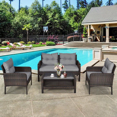 Costway 4 PCS PE Rattan Patio Conversation Set Outdoor Furniture Set w/ Glass Table - 4