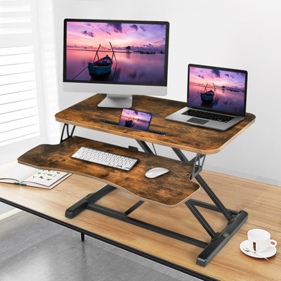 Desk riser with online adjustable keyboard tray