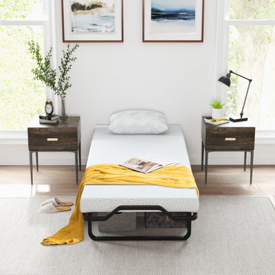 Folding metal deals bed with mattress