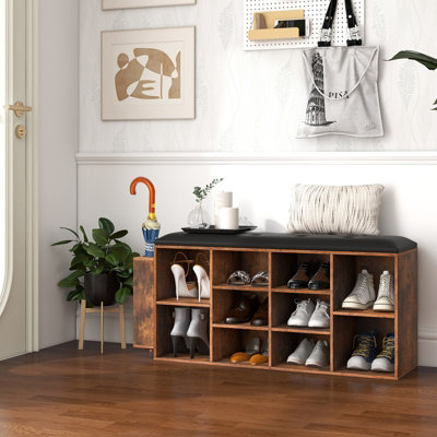 https://media.diy.com/is/image/KingfisherDigital/costway-wooden-shoe-bench-10-cube-entryway-shoe-storage-rack-padded-cushion-seat-with-umbrella-stand~6085650726320_03c_MP?$MOB_PREV$&$width=618&$height=618