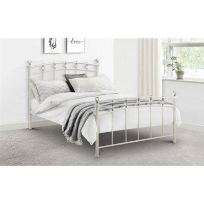 Double metal bed frame store with crystal finials