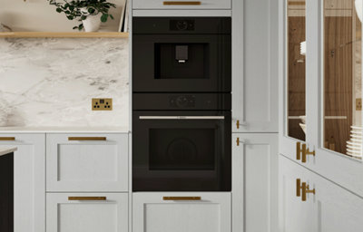 Light grey shaker style kitchen cabinets.