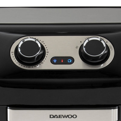 https://media.diy.com/is/image/KingfisherDigital/daewoo-12-litre-air-fryer-rotisserie-oven-black-sda2488ge~5024996943054_06c_MP?$MOB_PREV$&$width=618&$height=618