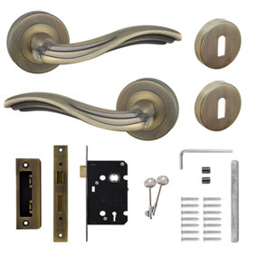 DecorAndDecor - Solace Antique Brass Privacy Door Lever Handles On Rose - Sash Lock Kit