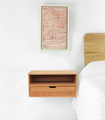 Wooden floating on sale bedside table