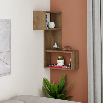 13 tiny geometric corner shelves with a key holder and some hooks