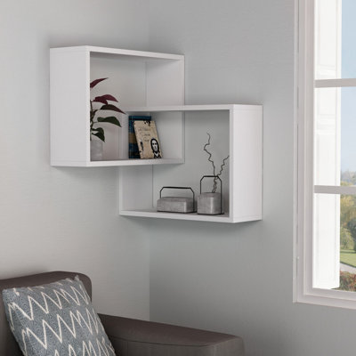 White wall mounted corner store shelving unit