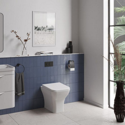https://media.diy.com/is/image/KingfisherDigital/dezine-cubo-back-to-wall-toilet-with-soft-close-seat~10008405_02c_MP?$MOB_PREV$&$width=618&$height=618