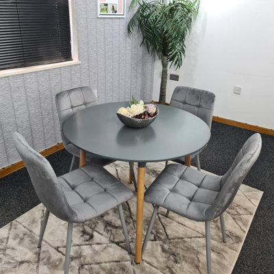 Round wooden table and 4 deals chairs