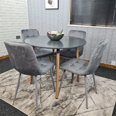 Round dining table with store four chairs