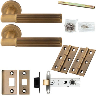 Door Handle & Latch Pack - Antique Brass - Flared Lined Reeded Lever On Round Rose