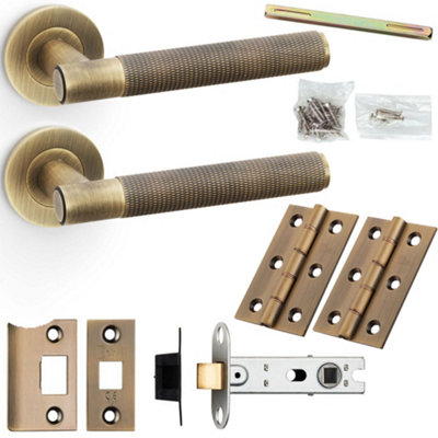 Door Handle & Latch Pack - Antique Brass - Straight Knurled Bar Lever On Round Rose