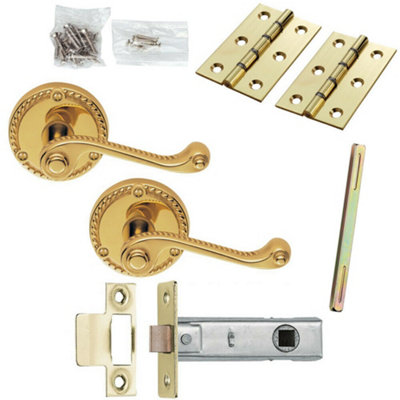 Door Handle & Latch Pack Brass Scroll Curved Screwless Round Rose DIY at B&Q