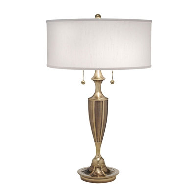 Elegant 2 Bulb Twin Table Lamp with Off White Shade and Burnished Brass Finish