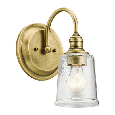 Elegant Arched Arm Wall Light with Clear Seeded Glass and Natural Brass Finish