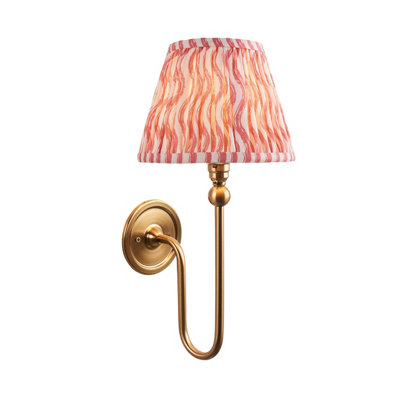 Elegant Dimmable Wall Light in Brushed Aged Brass with Coral Pink Fabric Shade