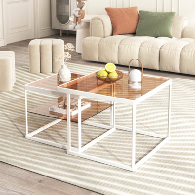 Adjustable glass deals coffee table