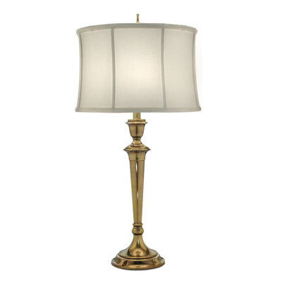 Elegant Zinc Cast Table Lamp with Oyster Silk Shade and Burnished Brass Finish