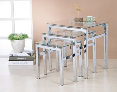 White glass nest store of tables