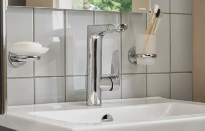 Family bathroom, close-up of the chrome basin mixer tap.