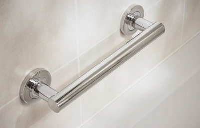 Family bathroom, close-up of the chrome grab rail.