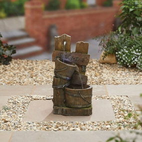 Fence Post Pours Water Feature Including LEDS - Poly-Resin - L22 x W28 x H52 cm - Brown