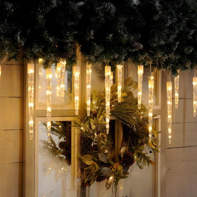Festive Indoor & Outdoor 24 Colour Changing Icicle Lights Warm White to ...