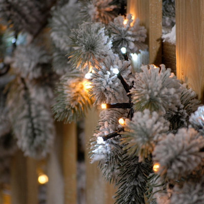 Festive Indoor & Outdoor Flickering 5ft Christmas Tree Lights 600 White and Warm White LEDs