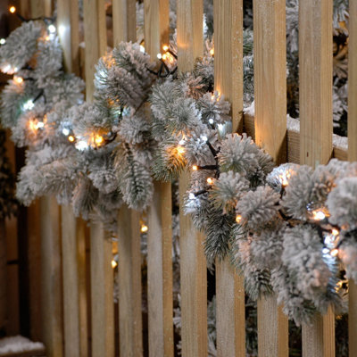 Festive Indoor & Outdoor Flickering 5ft Christmas Tree Lights 600 White and Warm White LEDs