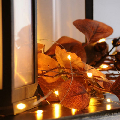 Festive Lights 2m 20 Amber LED Battery Powered Decorative Micro Firely Fairy String Lights on Silver Wire