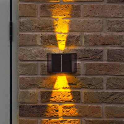 Festive Lights Up and Down Solar Powered Wall Light IP44 Waterproof ...