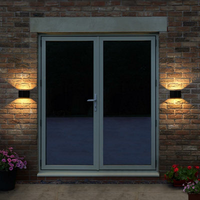 Festive Lights Up and Down Solar Powered Wall Light IP44 Waterproof ...