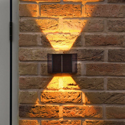 Festive Lights Up and Down Solar Powered Wall Light IP44 Waterproof ...