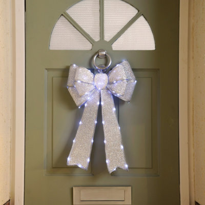 Festive Silver Battery Operated Christmas Door Bow with 84 Warm White LEDs