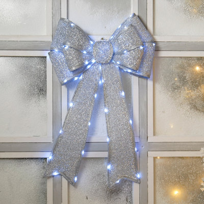 Festive Silver Battery Operated Christmas Door Bow with 84 Warm White LEDs