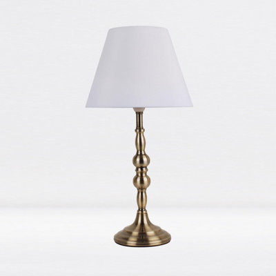 First Choice Lighting Set of 2 Antique Brass Plated Bedside Table Light with Candle Column White Fabric Shade