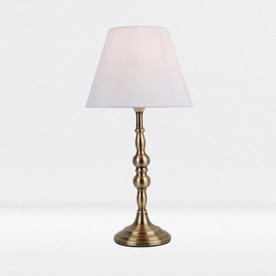 First Choice Lighting Set of 2 Antique Brass Plated Bedside Table Light with Candle Column White Fabric Shade