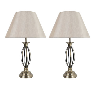 First Choice Lighting Set of 2 Cigar Antique Brass 55cm Table Lamps with Off White Fabric Shades