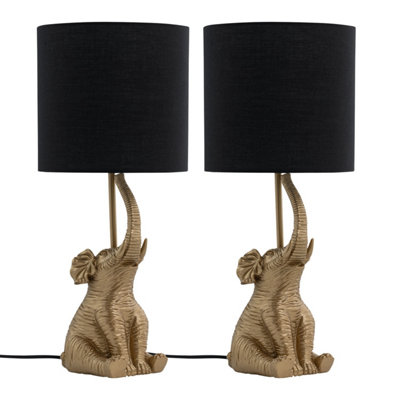 First Choice Lighting Set of 2 Elephant Gold Resin Table Lamps With Black Fabric Shades