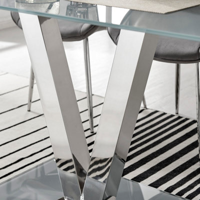 Florini Grey Glass And Chrome Metal 6 Seater Dining Table with Statement V Shaped Legs for Modern Minimalist Dining Room