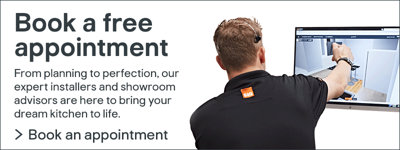 Book a free kitchen design appointment. Image of a showroom advisor pointing at a design on a screen.