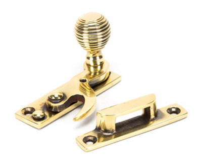From The Anvil Aged Brass Beehive Sash Hook Fastener