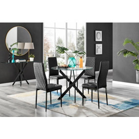 Furniturebox Novara Clear Tempered Glass 100cm Round Dining Table with Black Starburst Legs & 4 Black Milan Faux Leather Chairs
